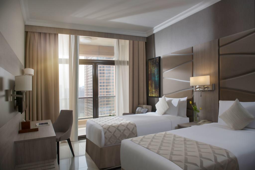ضورة لاحدى الغرف في شقق تو سيزونز الفندقية دبي